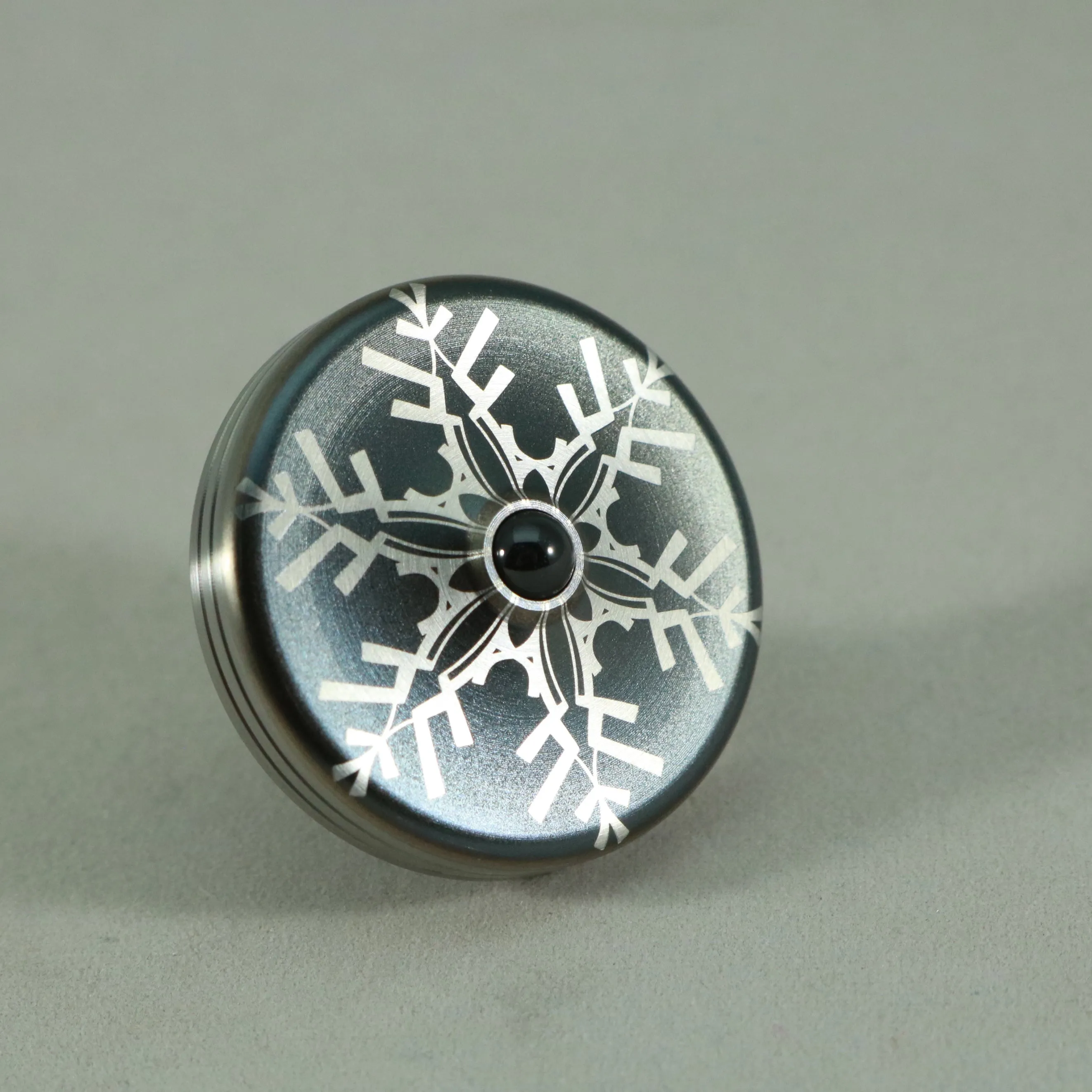 S2- Laser Etched  Inverted Snowflake on a Stainless Steel Spinning Top V2