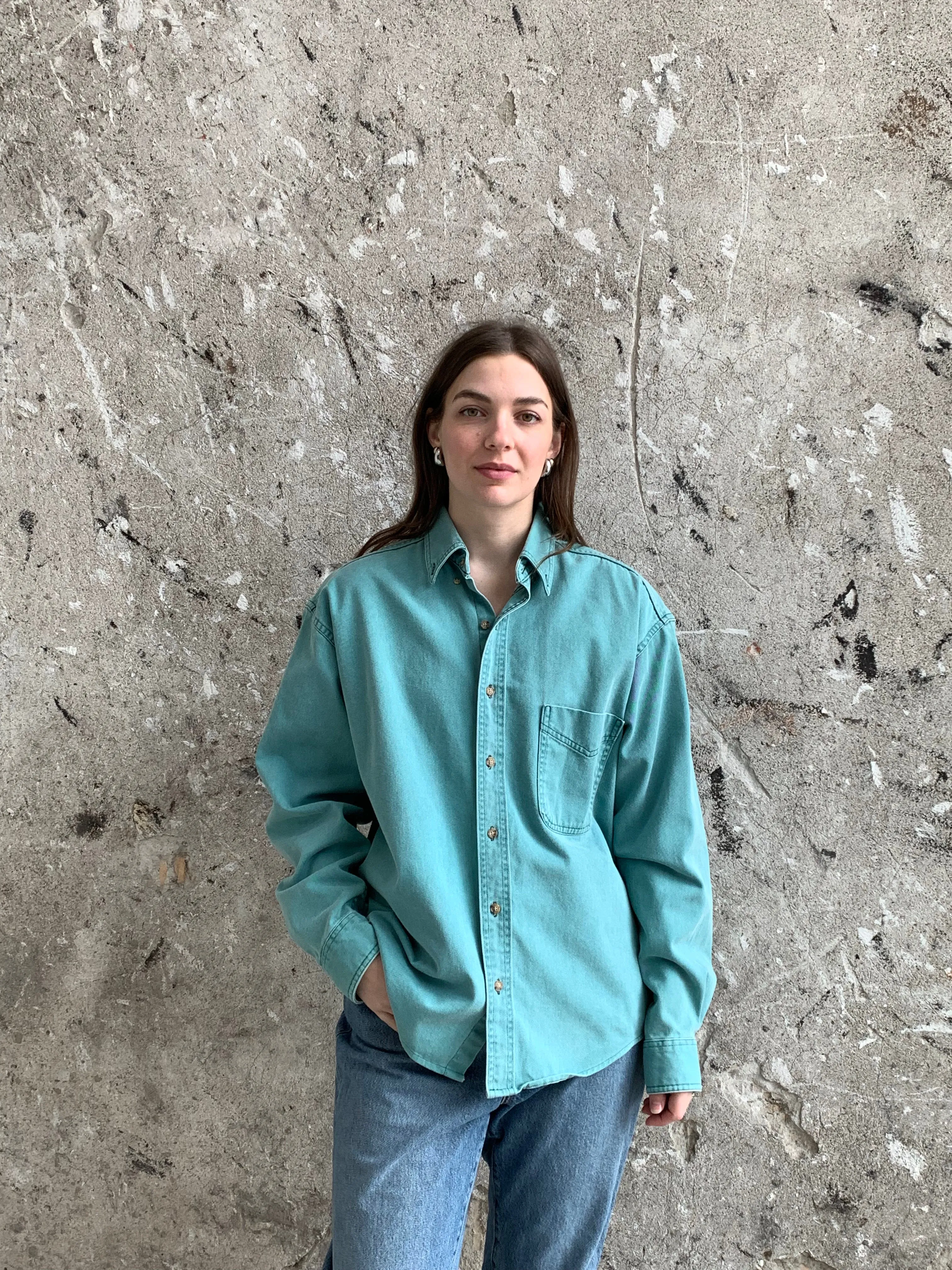 teal button down shirt