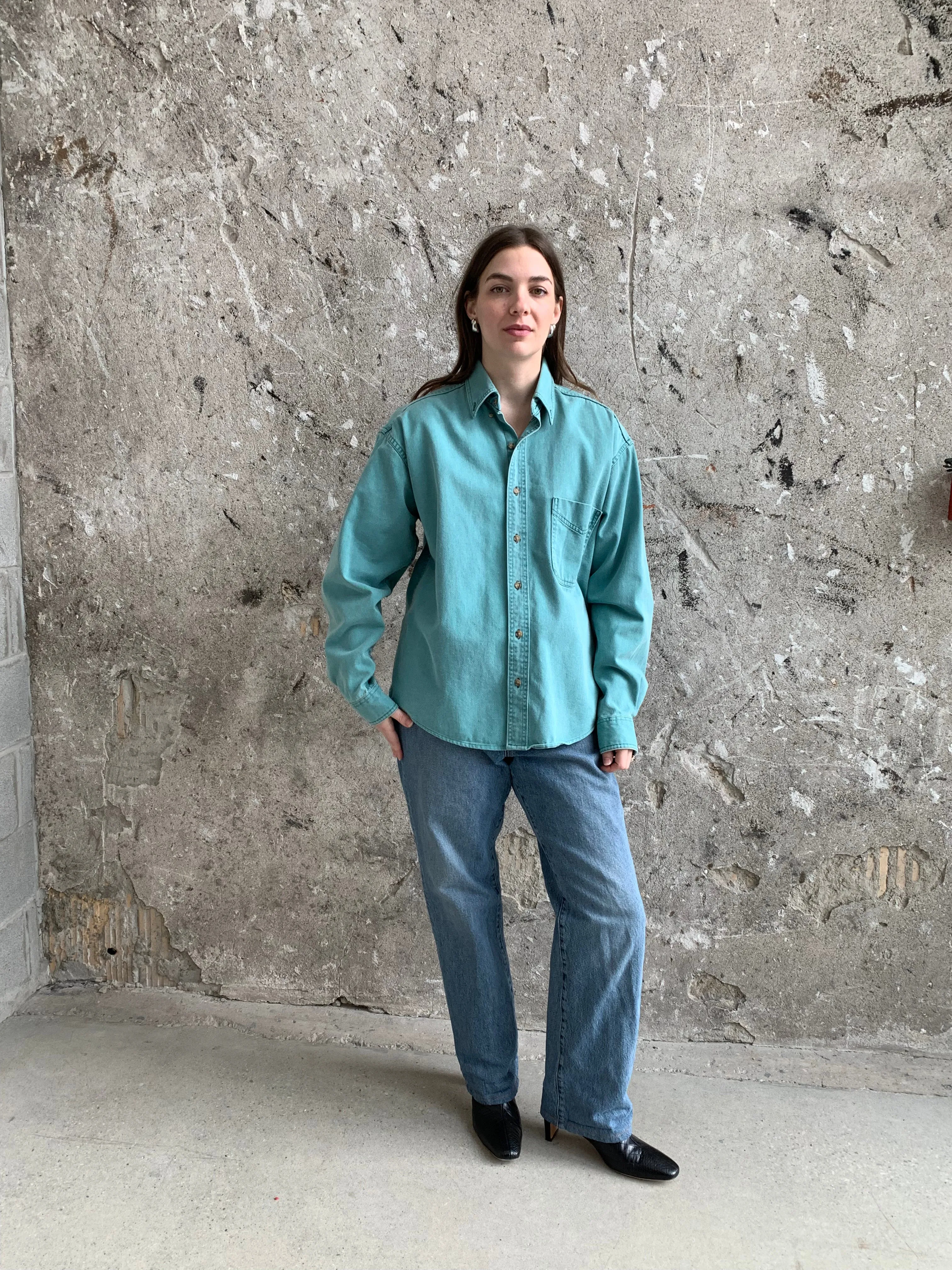 teal button down shirt