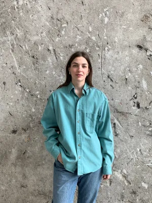 teal button down shirt
