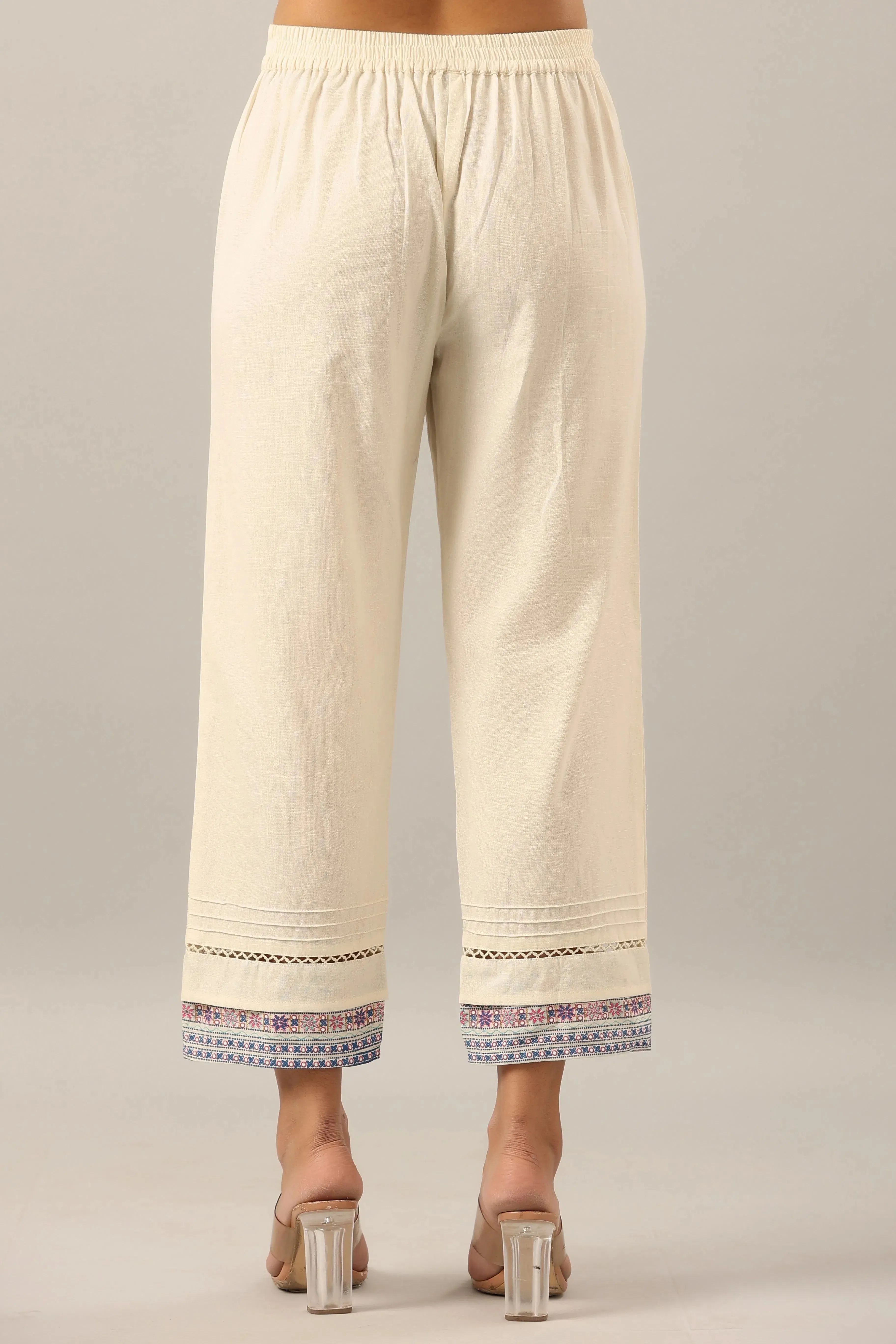 Women Off-White Cotton Flex Solid Pant.
