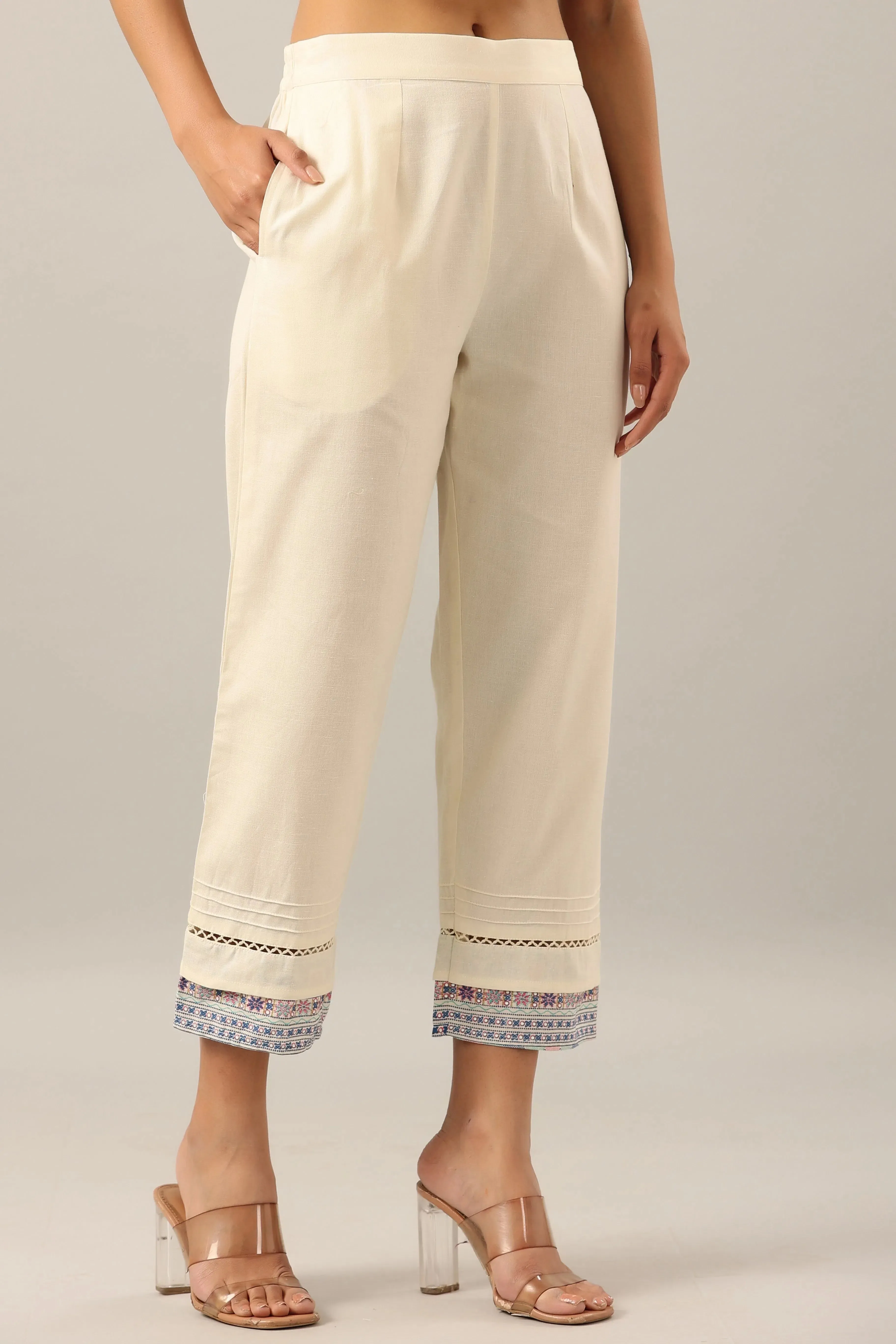 Women Off-White Cotton Flex Solid Pant.
