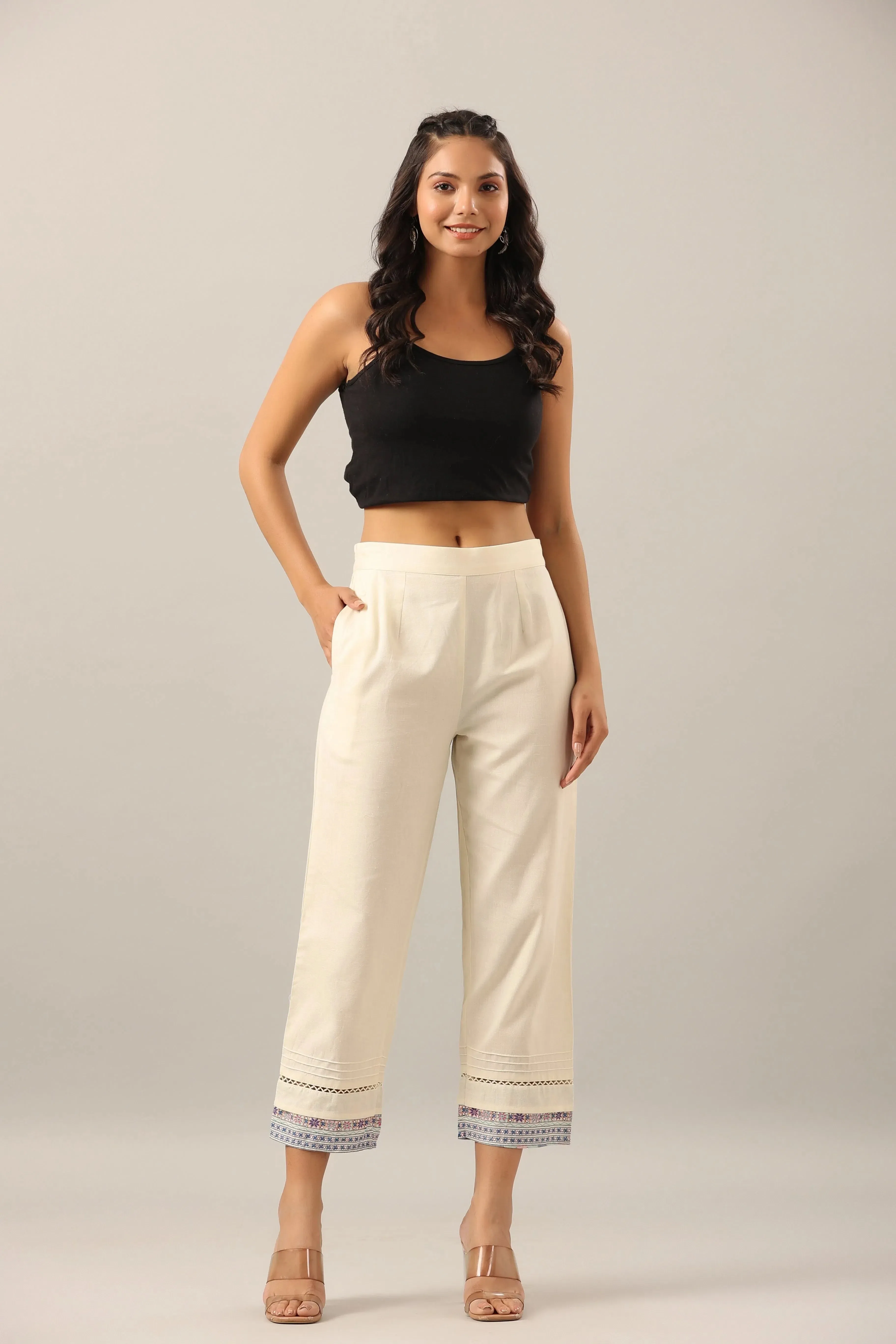 Women Off-White Cotton Flex Solid Pant.